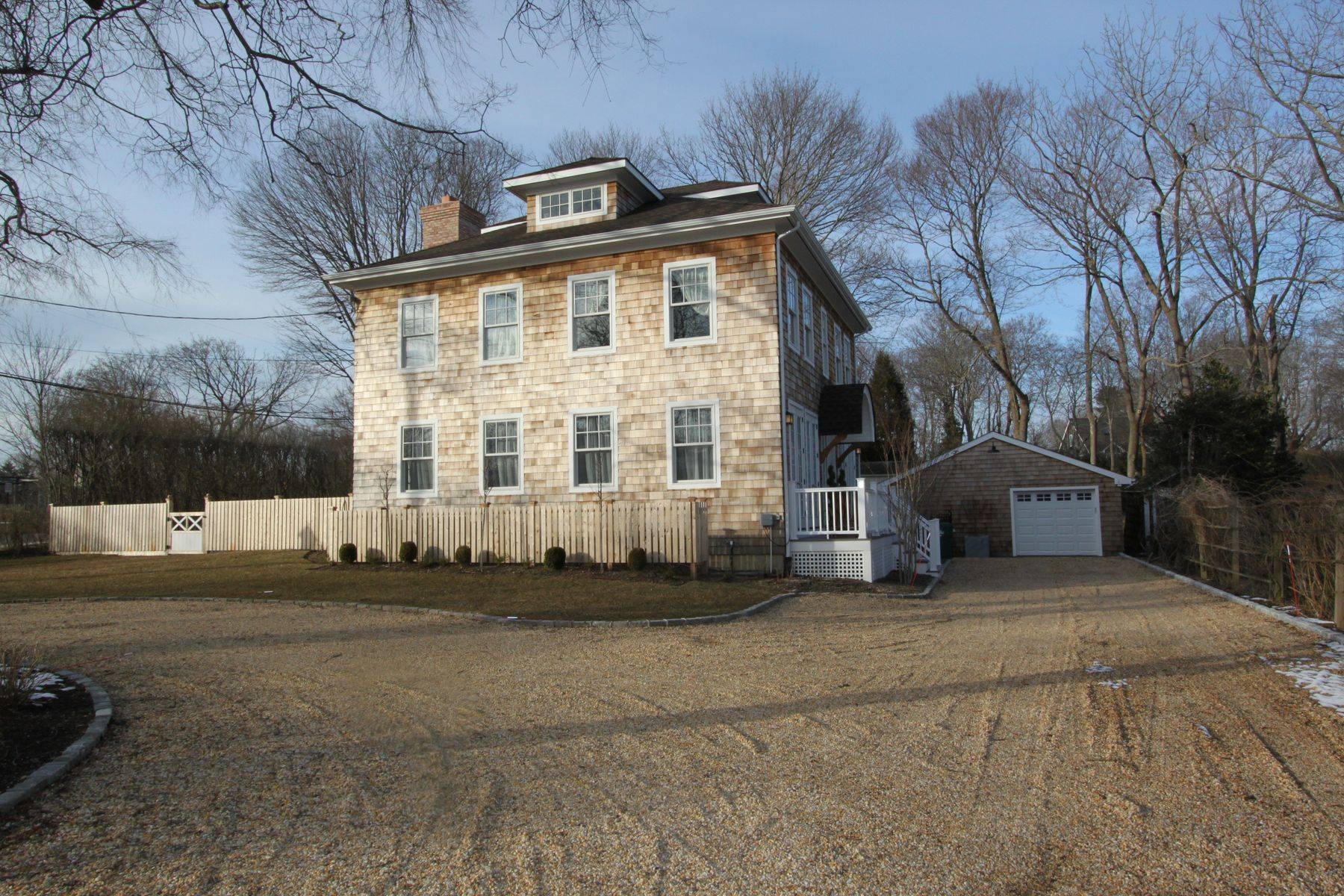 7 School Street Bridgehampton, NY 11932 - Photo 2 of 7 a front view of a house with a yard