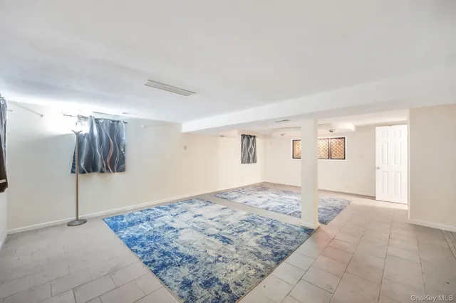 a view of a livingroom with wooden floor and closet