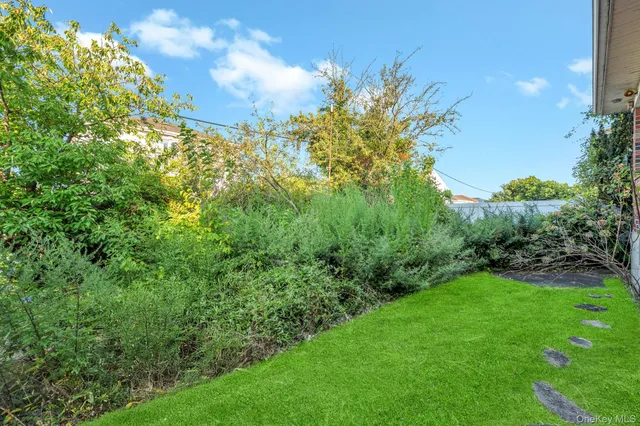 a view of a garden with a flower garden