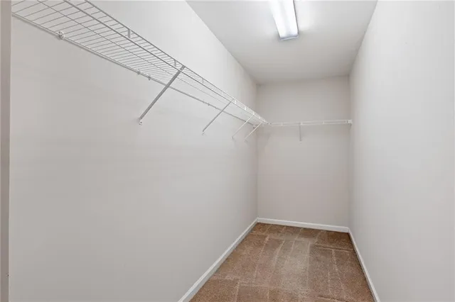 a view of a room with racks on the wall