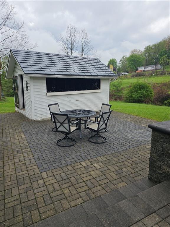 691 Old State Rte 66 Greensburg, PA 15601 - Photo 14 of 27 Paver stoned patio