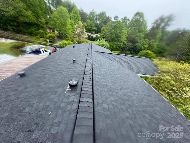 445 Old Holbert Road Hendersonville, NC 28792 - Photo 3 of 13 a view of a backyard