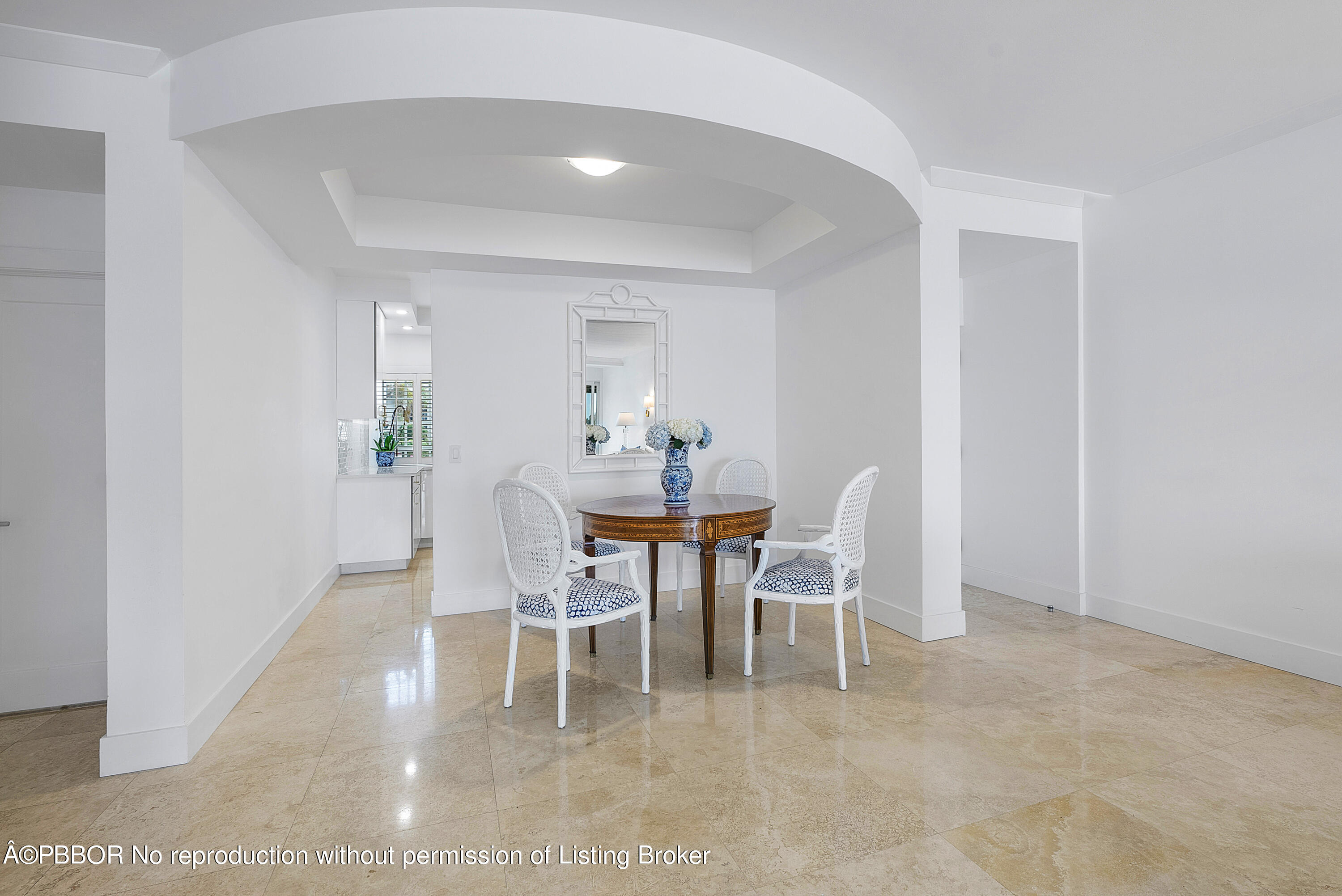 2180 Ibis Isle Road, Unit 5 Palm Beach, FL 33480 - Photo 12 of 39 a dining room with furniture and wooden floor