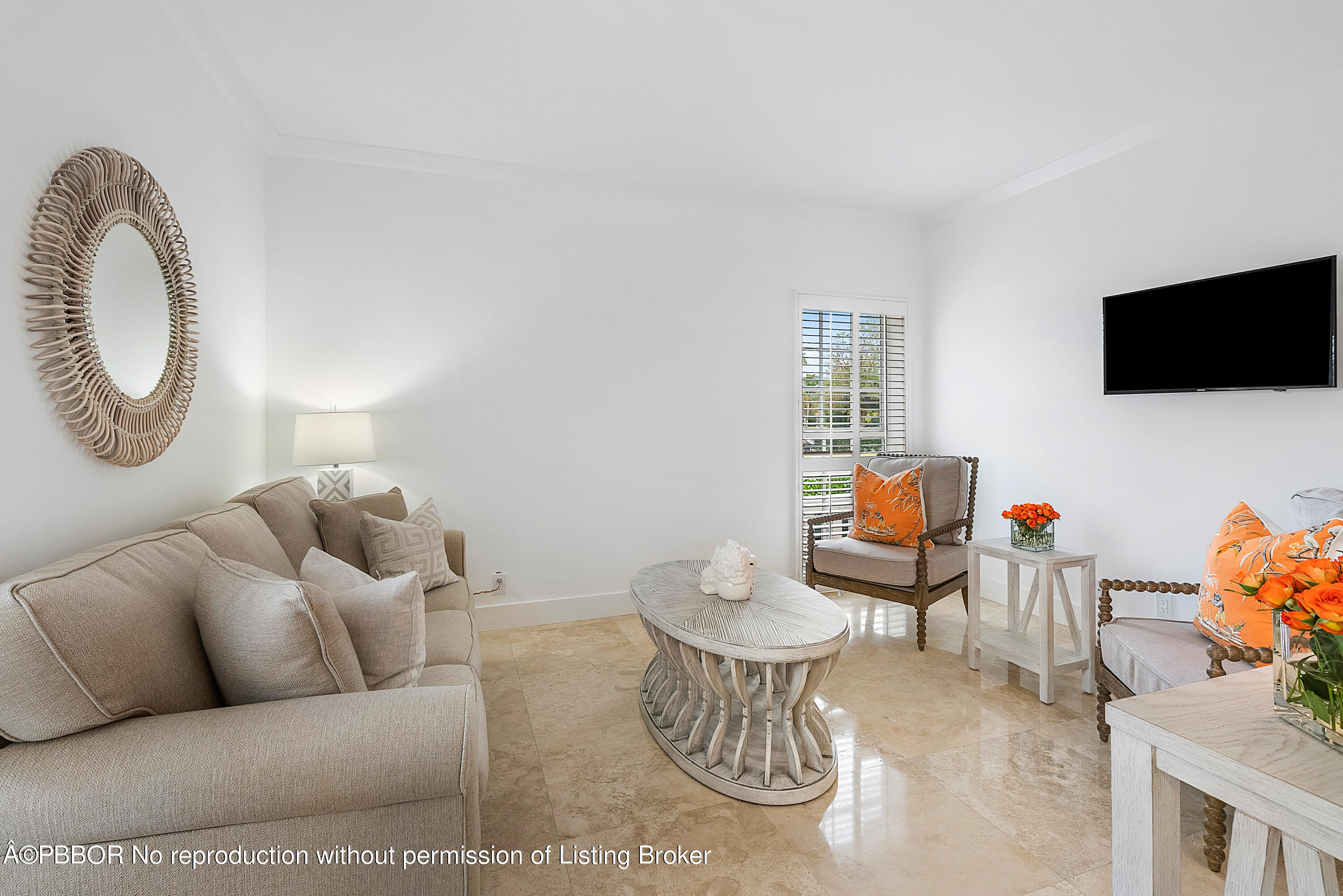 2180 Ibis Isle Road, Unit 5 Palm Beach, FL 33480 - Photo 20 of 39 a living room with furniture and a flat screen tv