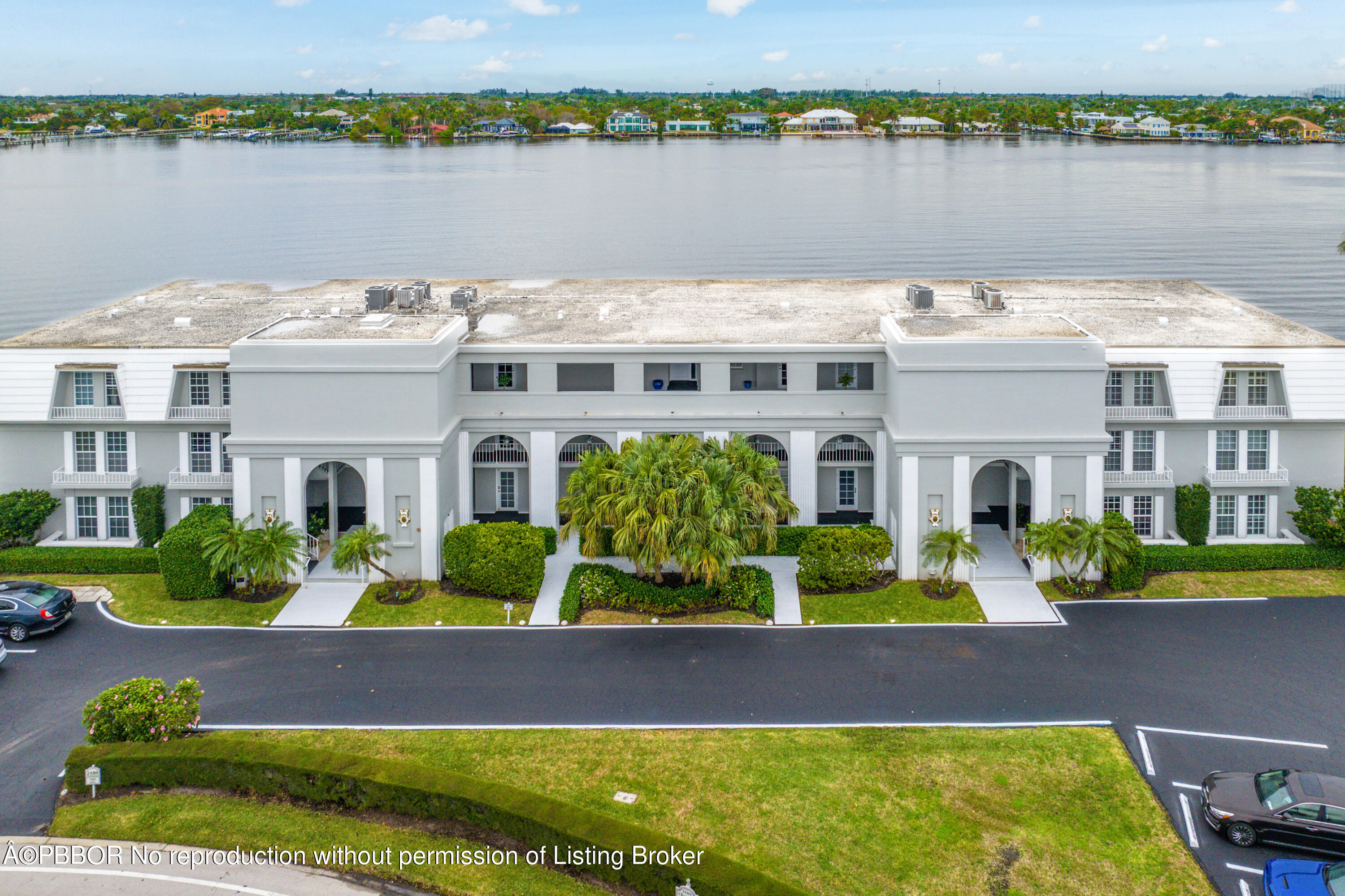2180 Ibis Isle Road, Unit 5 Palm Beach, FL 33480 - Photo 22 of 39 a front view of a house with a lake view