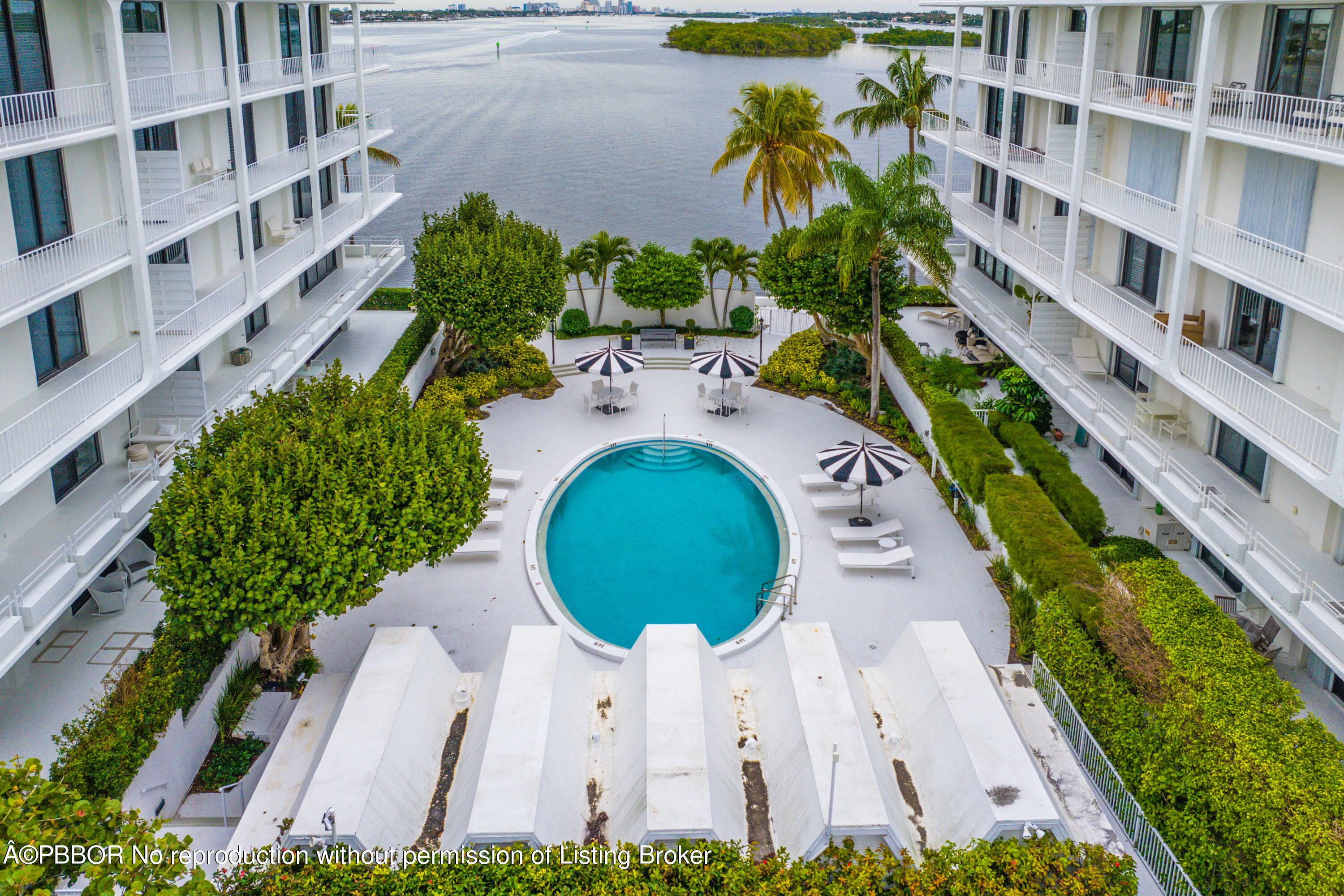 2180 Ibis Isle Road, Unit 5 Palm Beach, FL 33480 - Photo 31 of 39 an aerial view of a house with outdoor space and trees all around