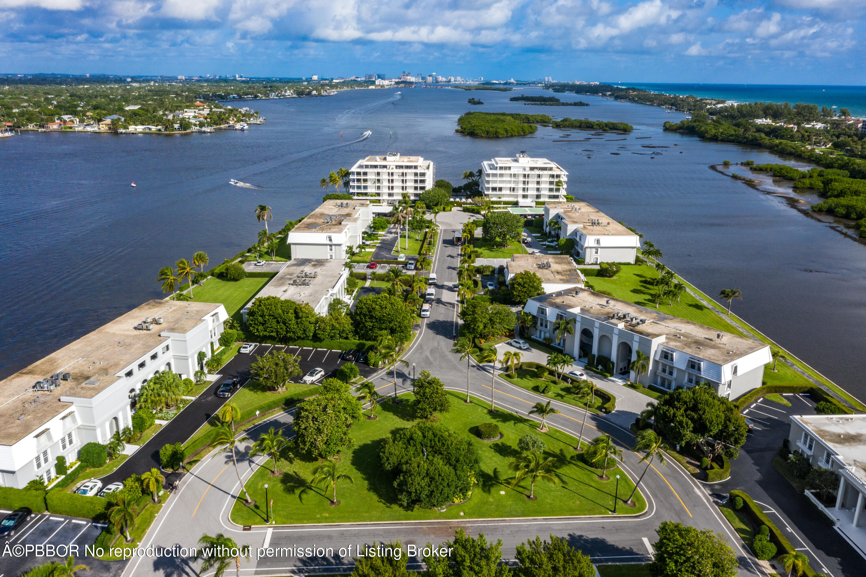 2180 Ibis Isle Road, Unit 5 Palm Beach, FL 33480 - Photo 38 of 39 an aerial view of a house with a garden and lake view
