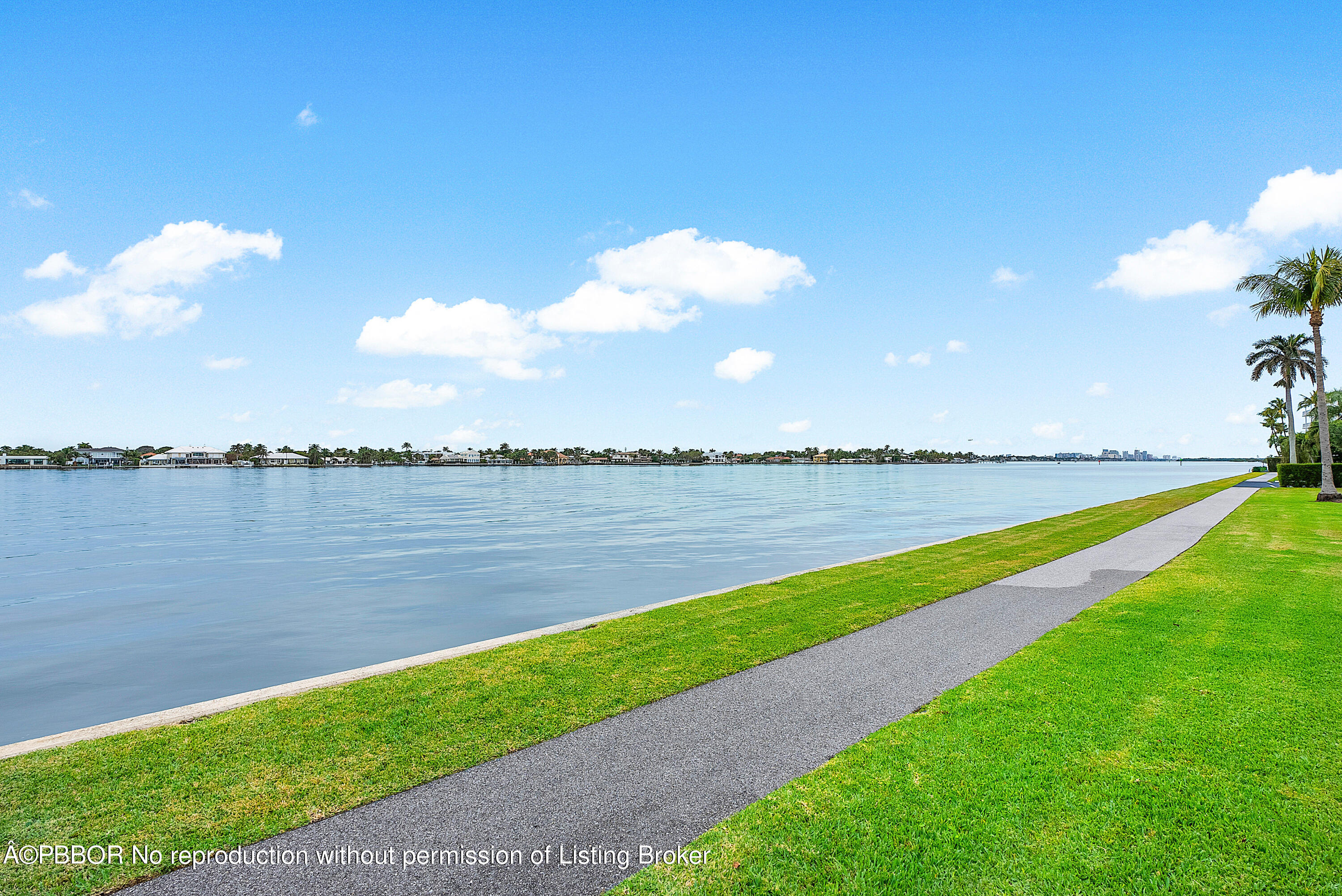 2180 Ibis Isle Road, Unit 5 Palm Beach, FL 33480 - Photo 6 of 39 a view of a lake with a big yard