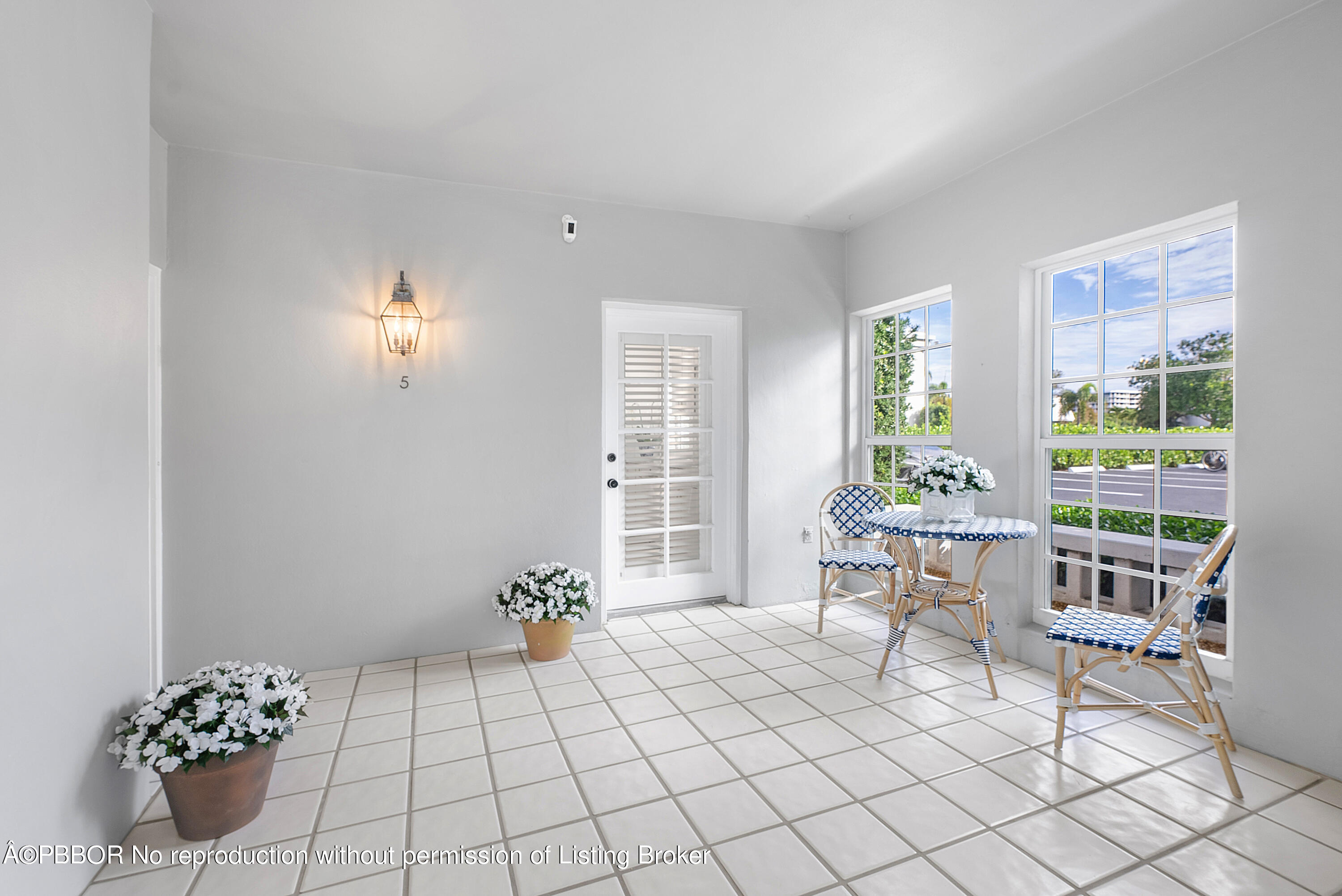 2180 Ibis Isle Road, Unit 5 Palm Beach, FL 33480 - Photo 7 of 39 a view of a workspace with furniture and a window