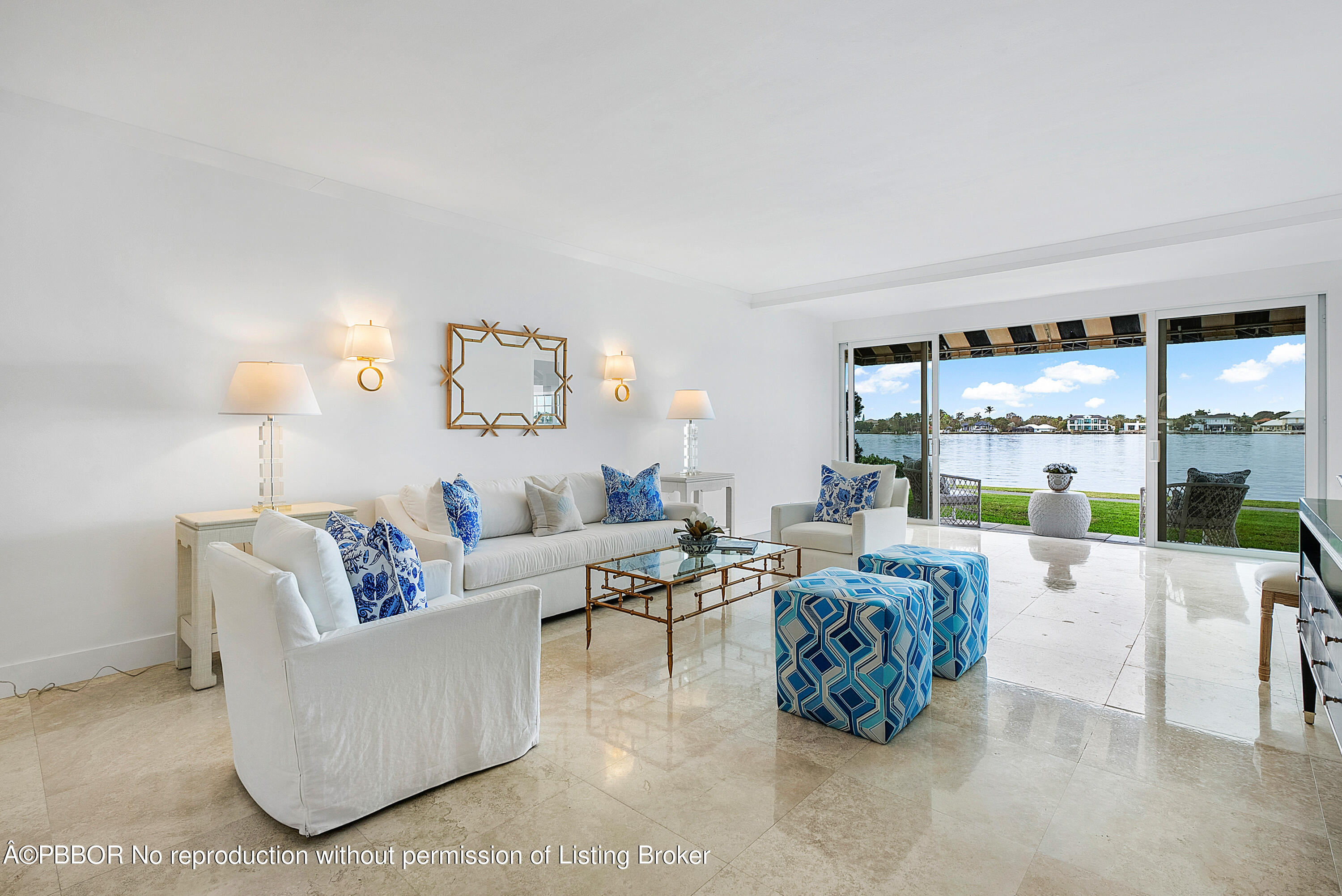 2180 Ibis Isle Road, Unit 5 Palm Beach, FL 33480 - Photo 9 of 39 a living room with furniture and large windows