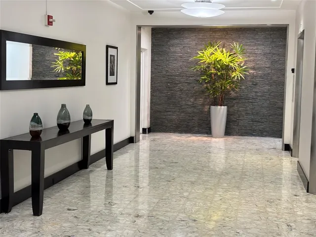 a view of a chairs and table on the terrace