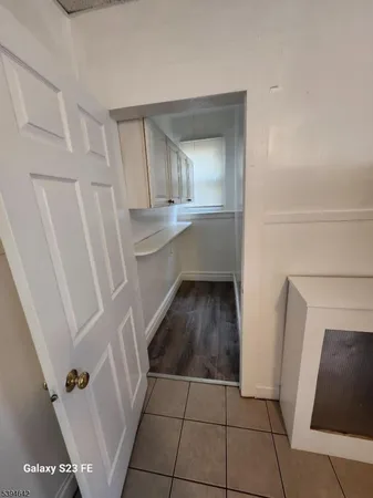 a bathroom with sink and mirror