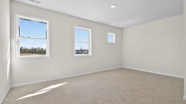 a bathroom with a double vanity sink mirror and bathtub