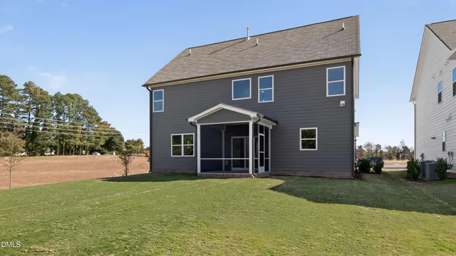 a view of porch with a yard
