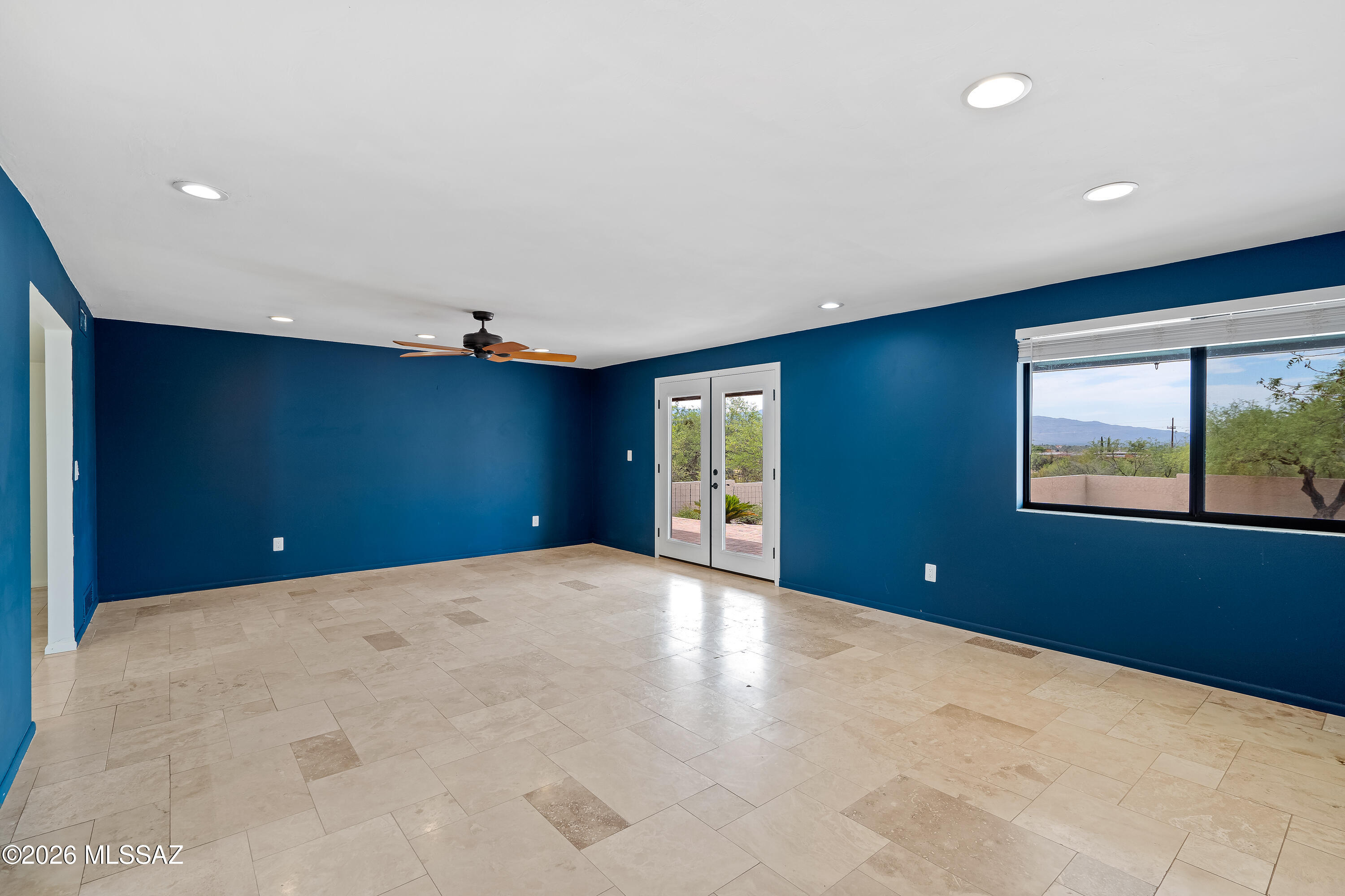9420 East Ravine Trail Tucson, AZ 85749 - Photo 7 of 39 a view of an empty room with a window