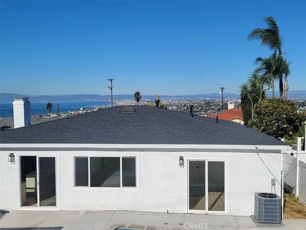 an aerial view of residential house and outdoor space