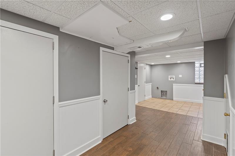 396 Hoffman Road Pittsburgh, PA 15212 - Photo 19 of 24 You can use this fully finished basement for many uses! Would be great for a play room or an office! All of the utilities are enclosed! Laundry has its own area!