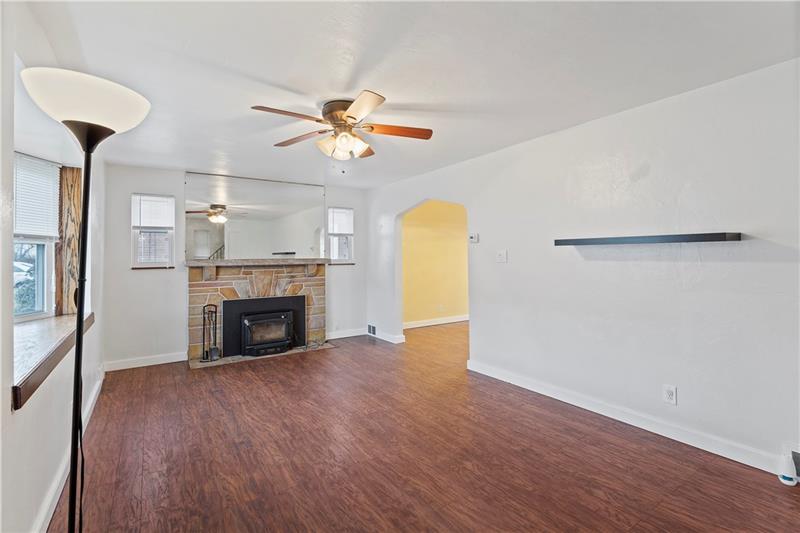 396 Hoffman Road Pittsburgh, PA 15212 - Photo 5 of 24 Warm the home with this wood burning fireplace with blower! The stone work surround and mantle is stunning!