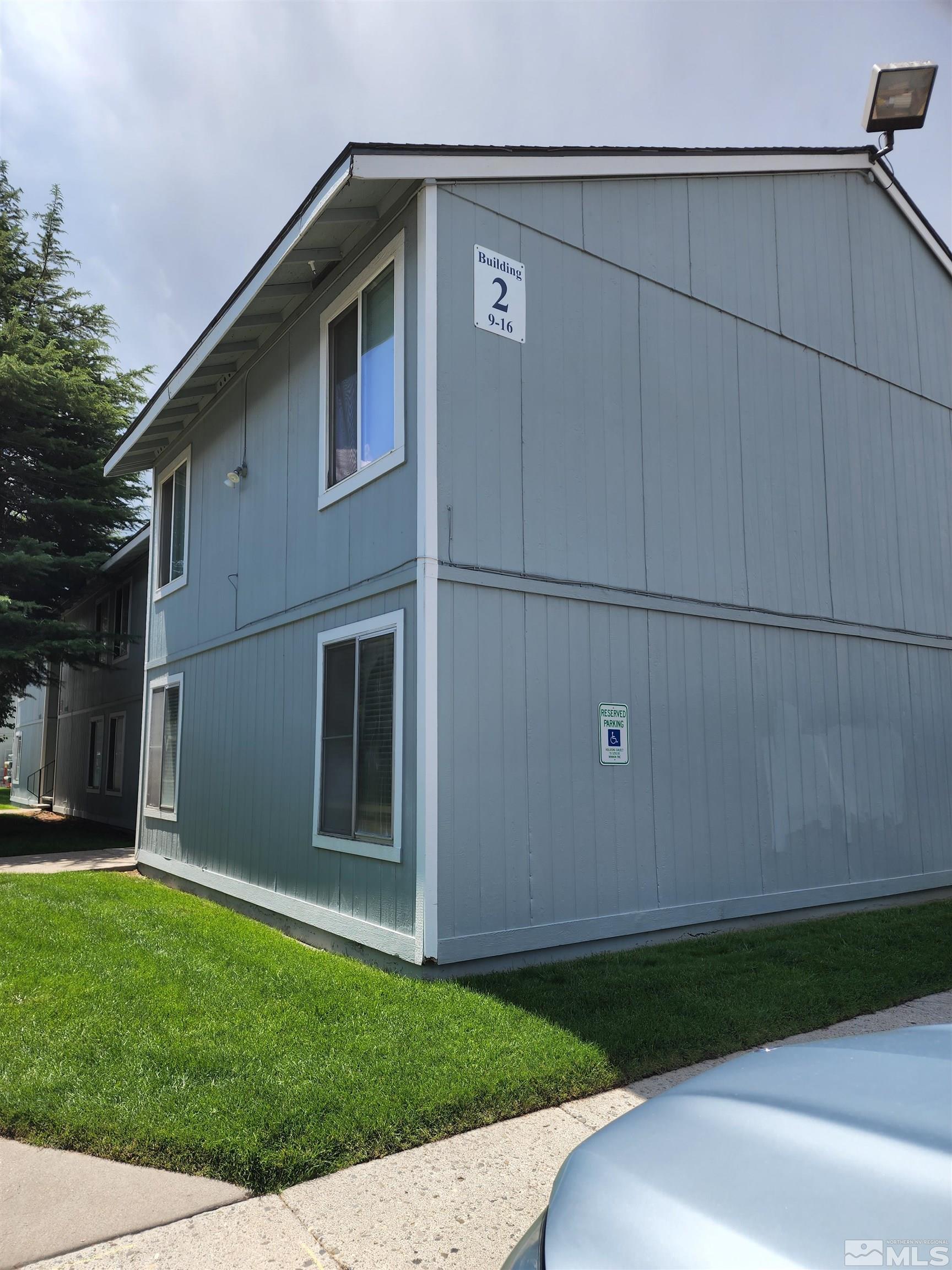 4600 Neil Road, Unit 9 Reno, NV 89502 - Photo 5 of 21 a front view of a house with garden
