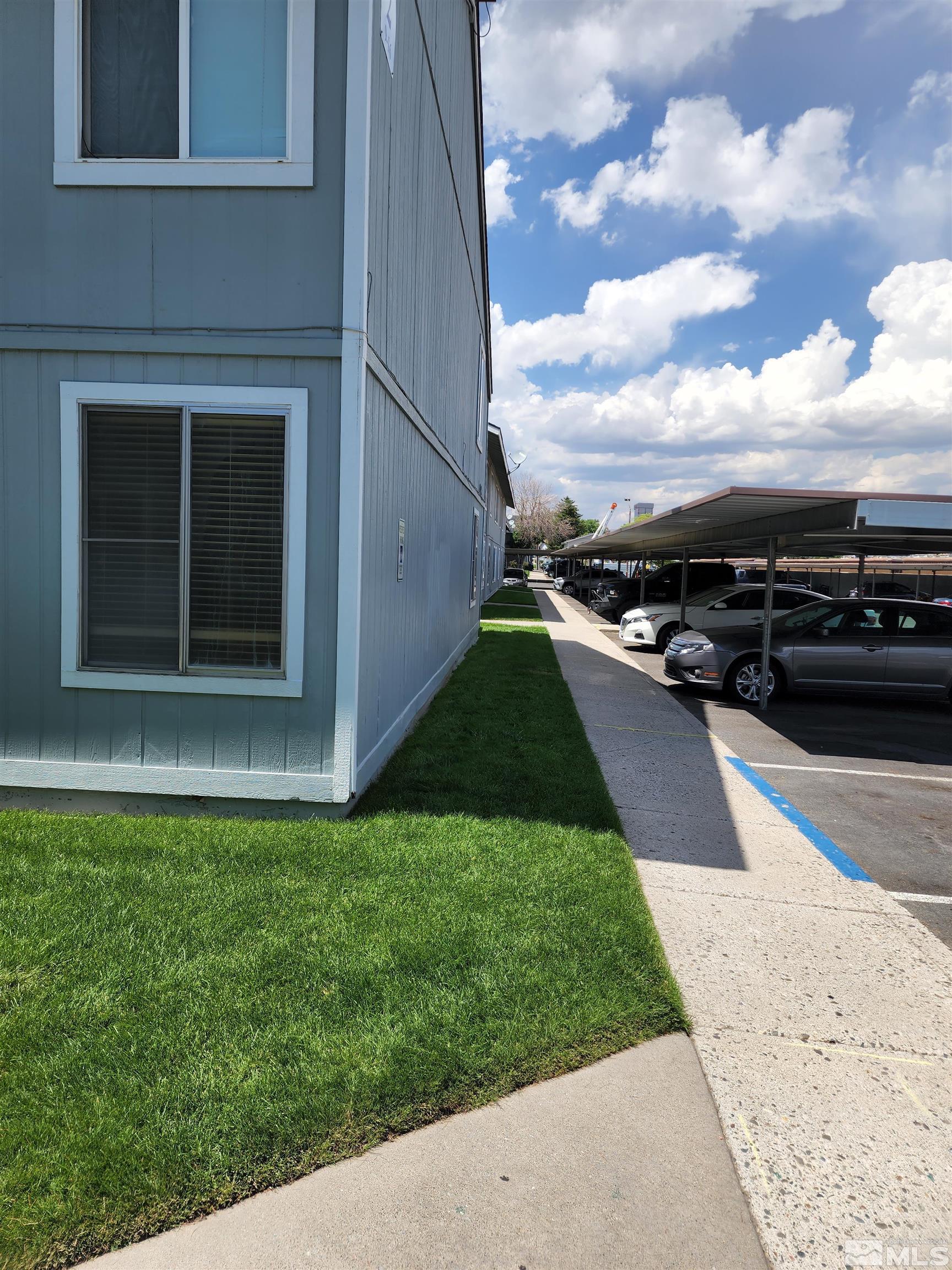 4600 Neil Road, Unit 9 Reno, NV 89502 - Photo 6 of 21 front view of a house with a yard