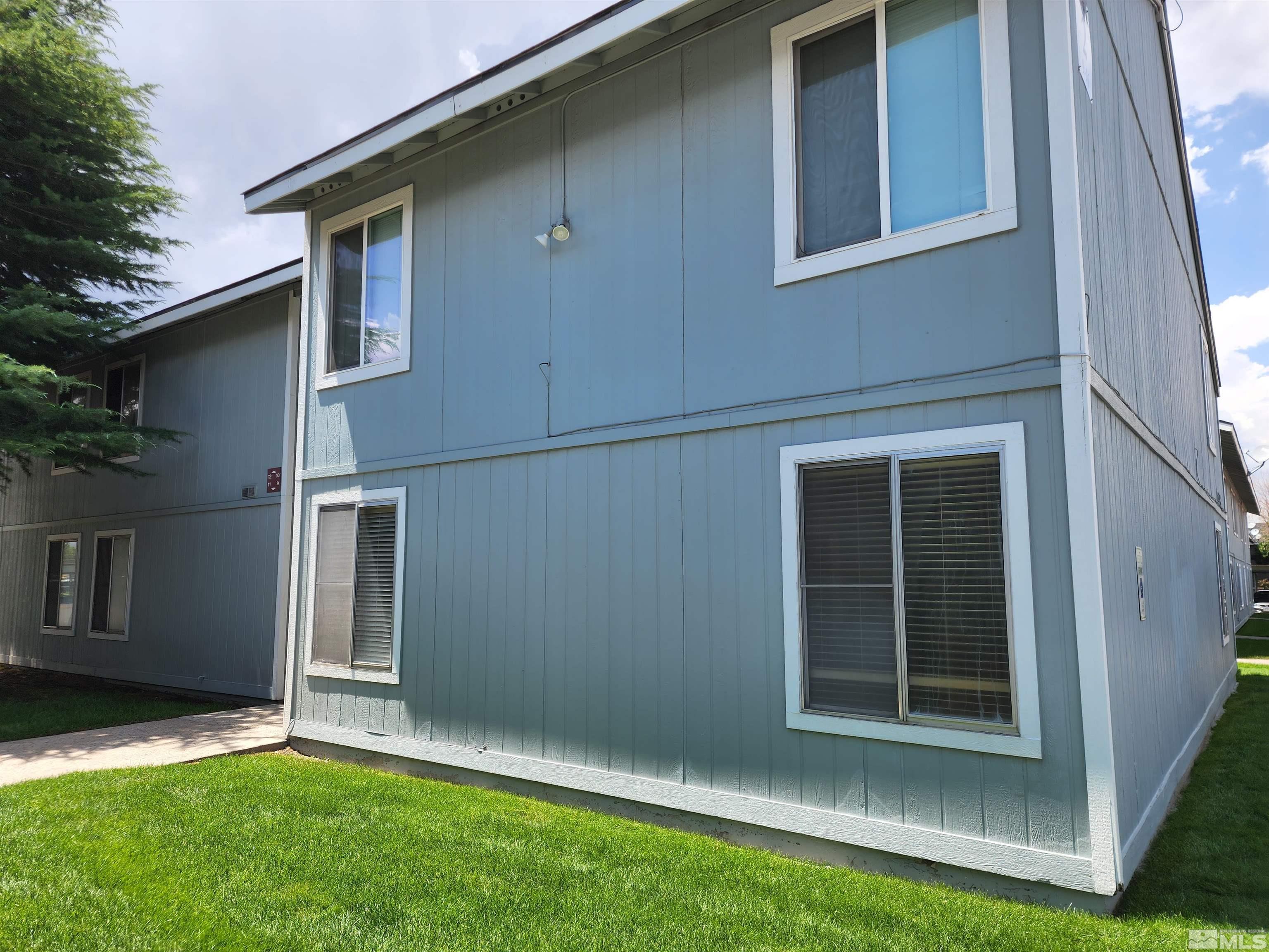 4600 Neil Road, Unit 9 Reno, NV 89502 - Photo 7 of 21 a backyard of a house with lots of green space