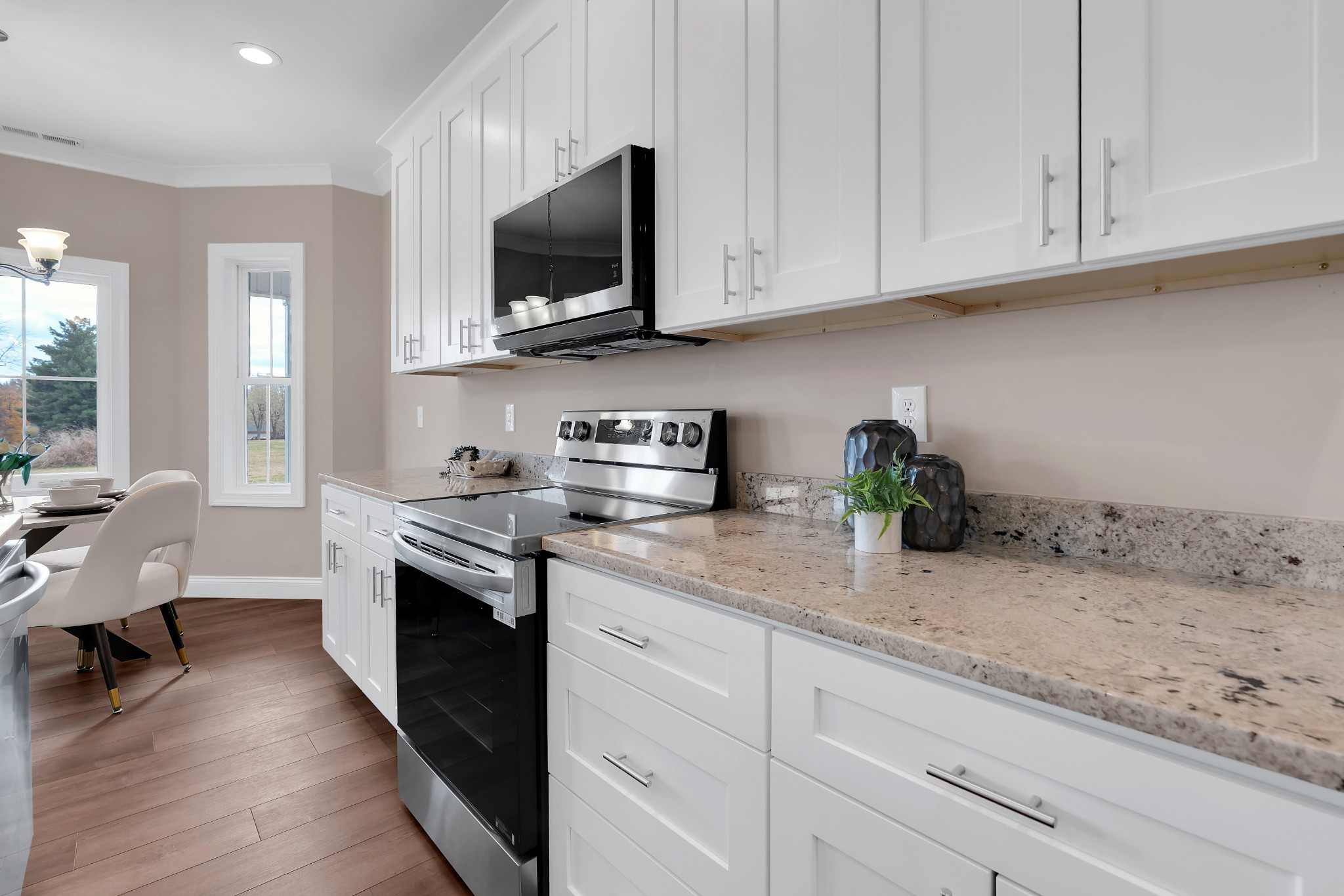 249 Lookout Drive Winchester, TN 37398 - Photo 18 of 63 a kitchen with stainless steel appliances granite countertop a sink and a stove top oven
