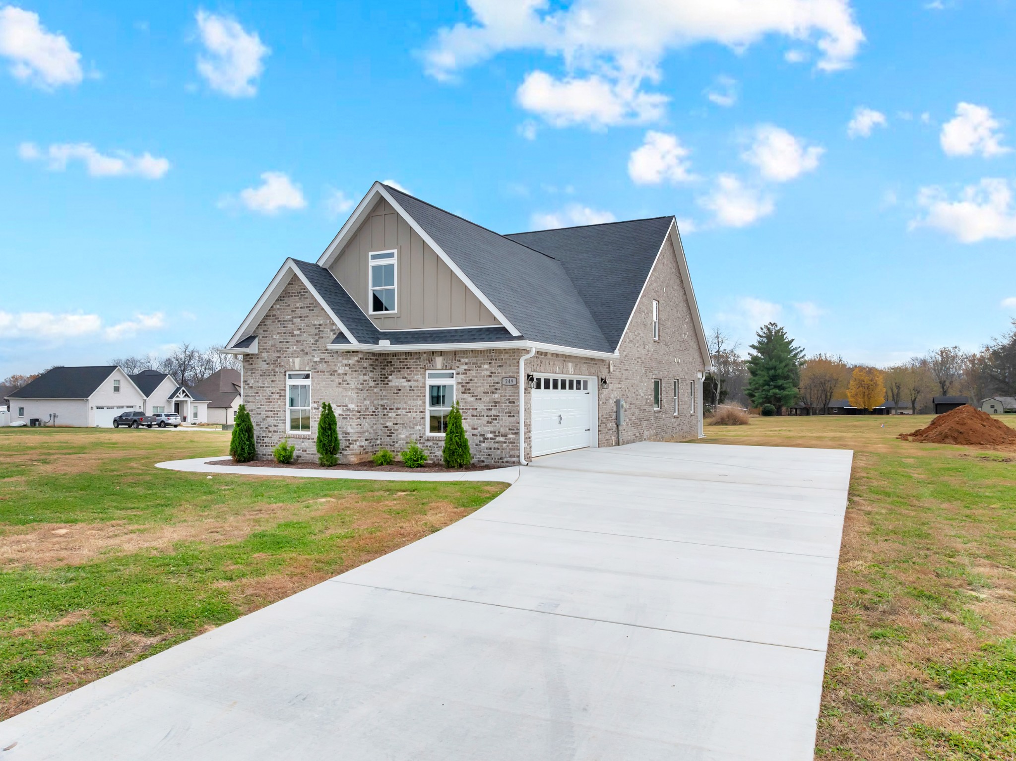 249 Lookout Drive Winchester, TN 37398 - Photo 51 of 63 a front view of a house with a yard and garage
