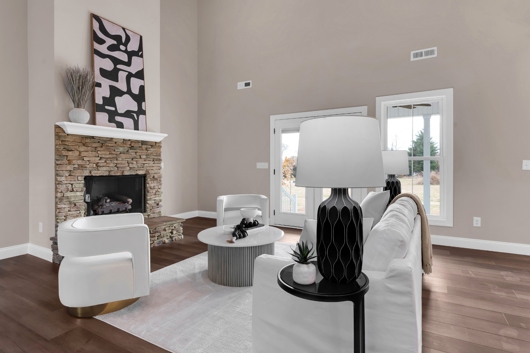 249 Lookout Drive Winchester, TN 37398 - Photo 9 of 63 a living room with furniture a fireplace and potted plants