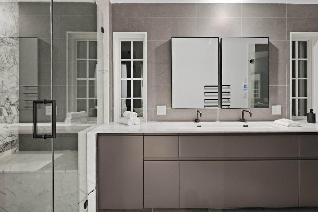 85 Willard Road Brookline, MA 02445 - Photo 13 of 29 a bathroom with a sink and a mirror