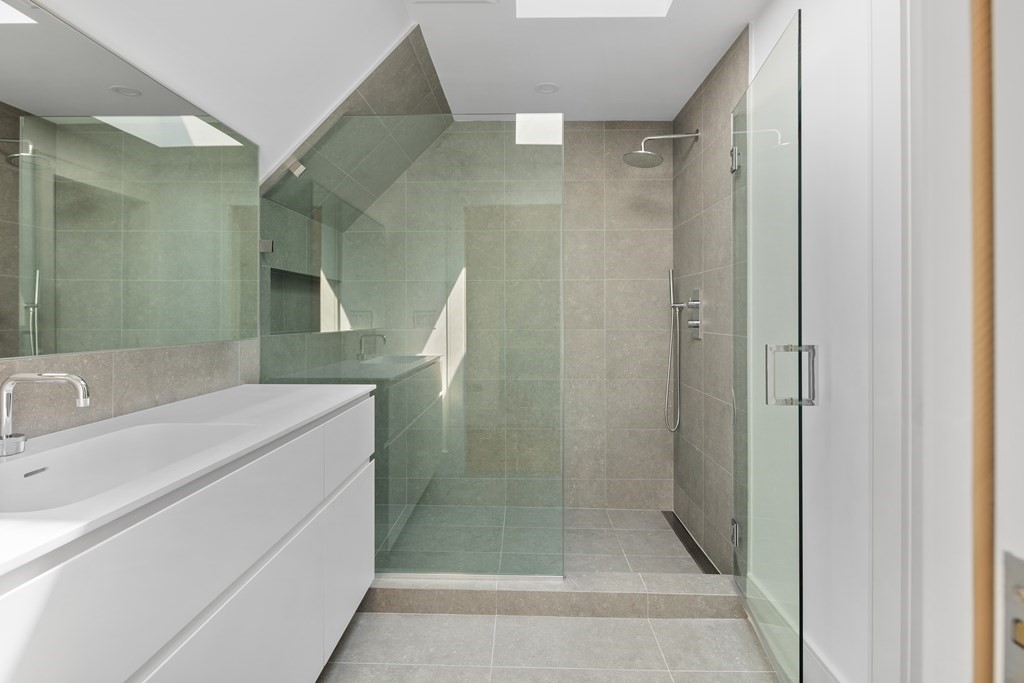 85 Willard Road Brookline, MA 02445 - Photo 21 of 29 a bathroom with a shower and a sink