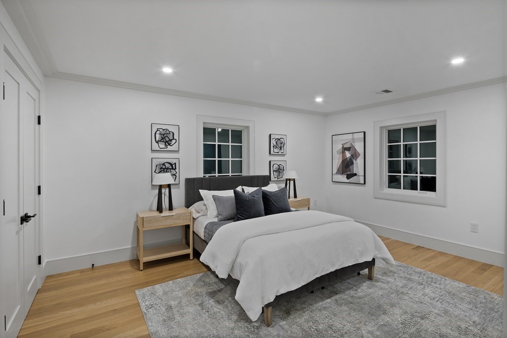85 Willard Road Brookline, MA 02445 - Photo 24 of 29 a bedroom with a large bed and a window