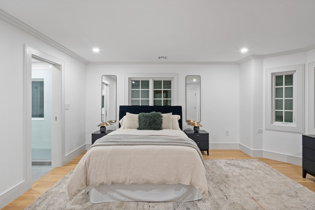 85 Willard Road Brookline, MA 02445 - Photo 26 of 29 a bedroom with a bed and a window
