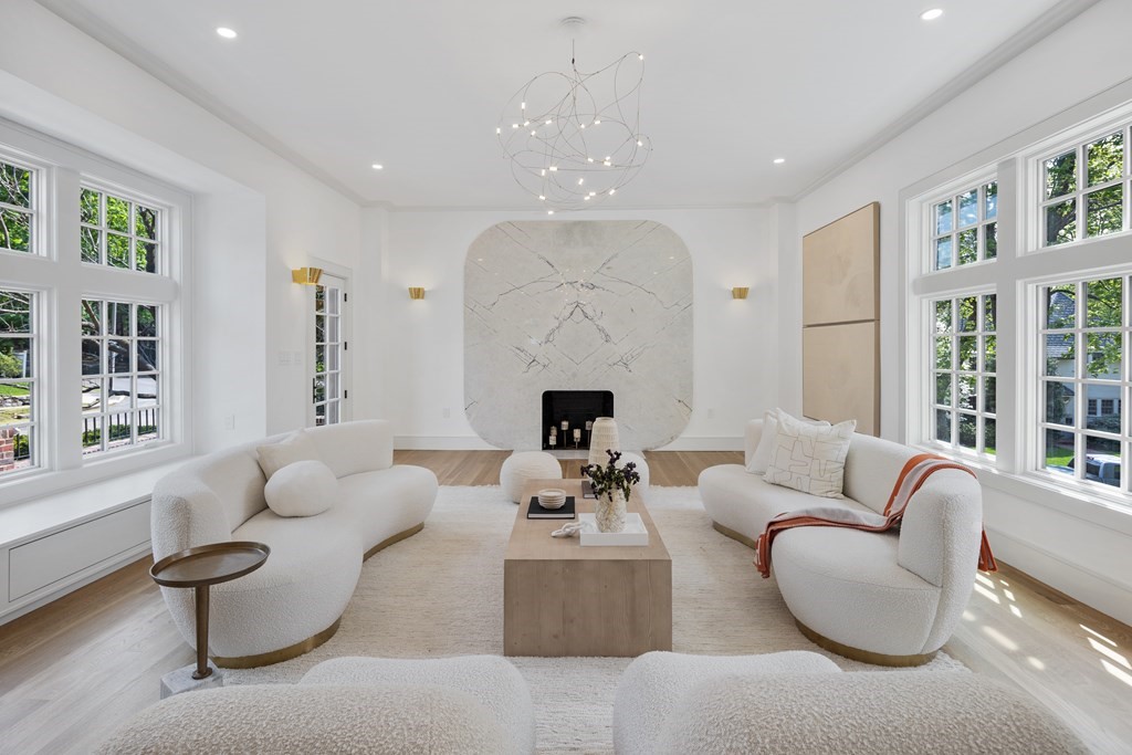 85 Willard Road Brookline, MA 02445 - Photo 27 of 29 a living room with fireplace furniture and a large window