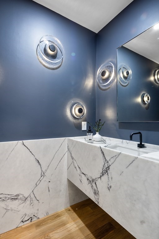 85 Willard Road Brookline, MA 02445 - Photo 7 of 29 a bathroom with a sink and a mirror