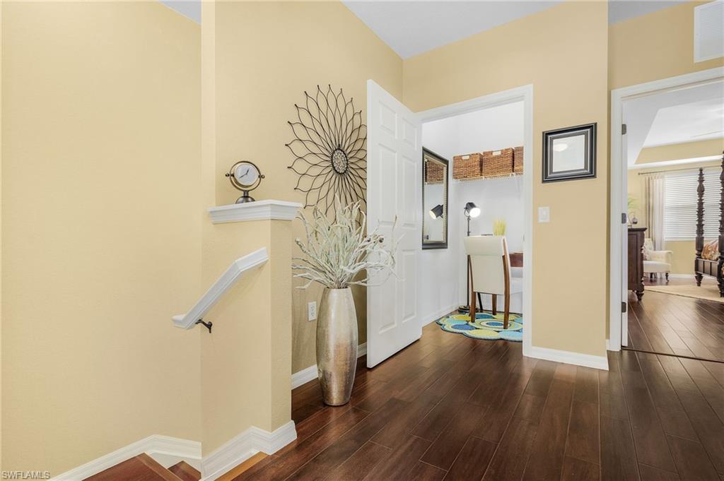 9803 Bodego Way, Unit 104 Fort Myers, FL 33908 - Photo 14 of 31 a view of entryway with wooden floor
