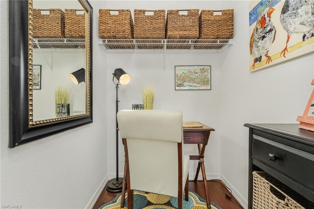 9803 Bodego Way, Unit 104 Fort Myers, FL 33908 - Photo 26 of 31 a view of workspace with mirror on the wall