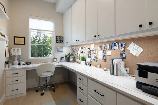 a view of swimming pool with a couches and lounge chairs