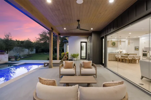 a view of outdoor kitchen and dining room