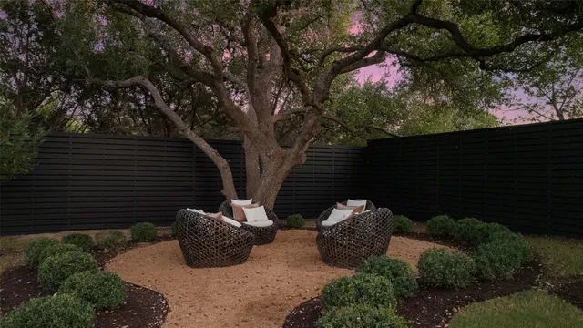 an aerial view of a house with a garden