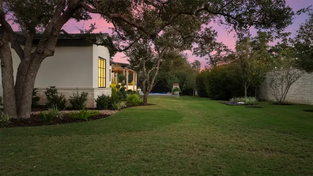 an aerial view of a house with a garden