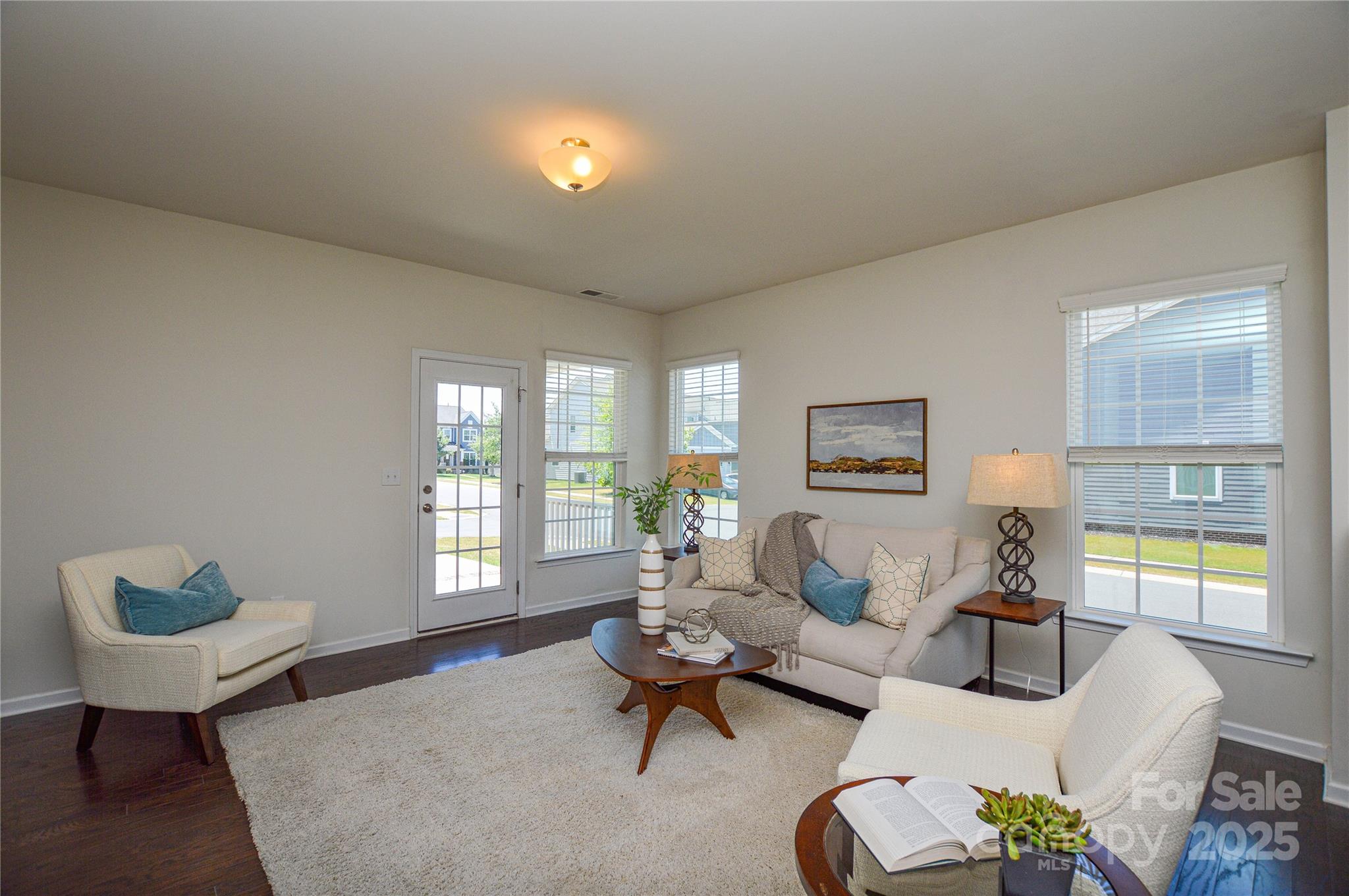 6096 Cloverdale Drive Fort Mill, SC 29708 - Photo 11 of 48 a living room with furniture and a large window