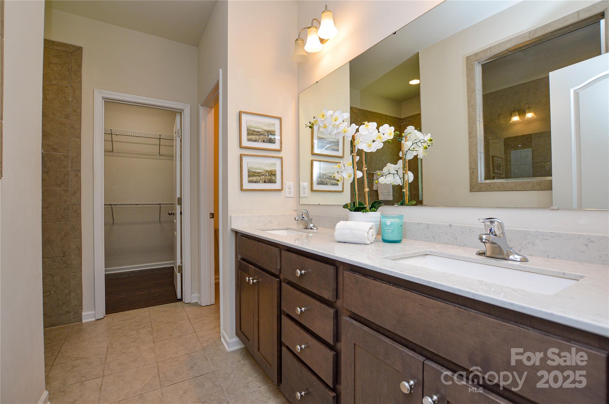 6096 Cloverdale Drive Fort Mill, SC 29708 - Photo 23 of 48 a bathroom with a double vanity sink mirror and shower