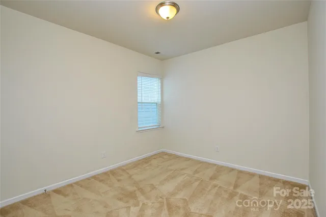 a view of a room with a window