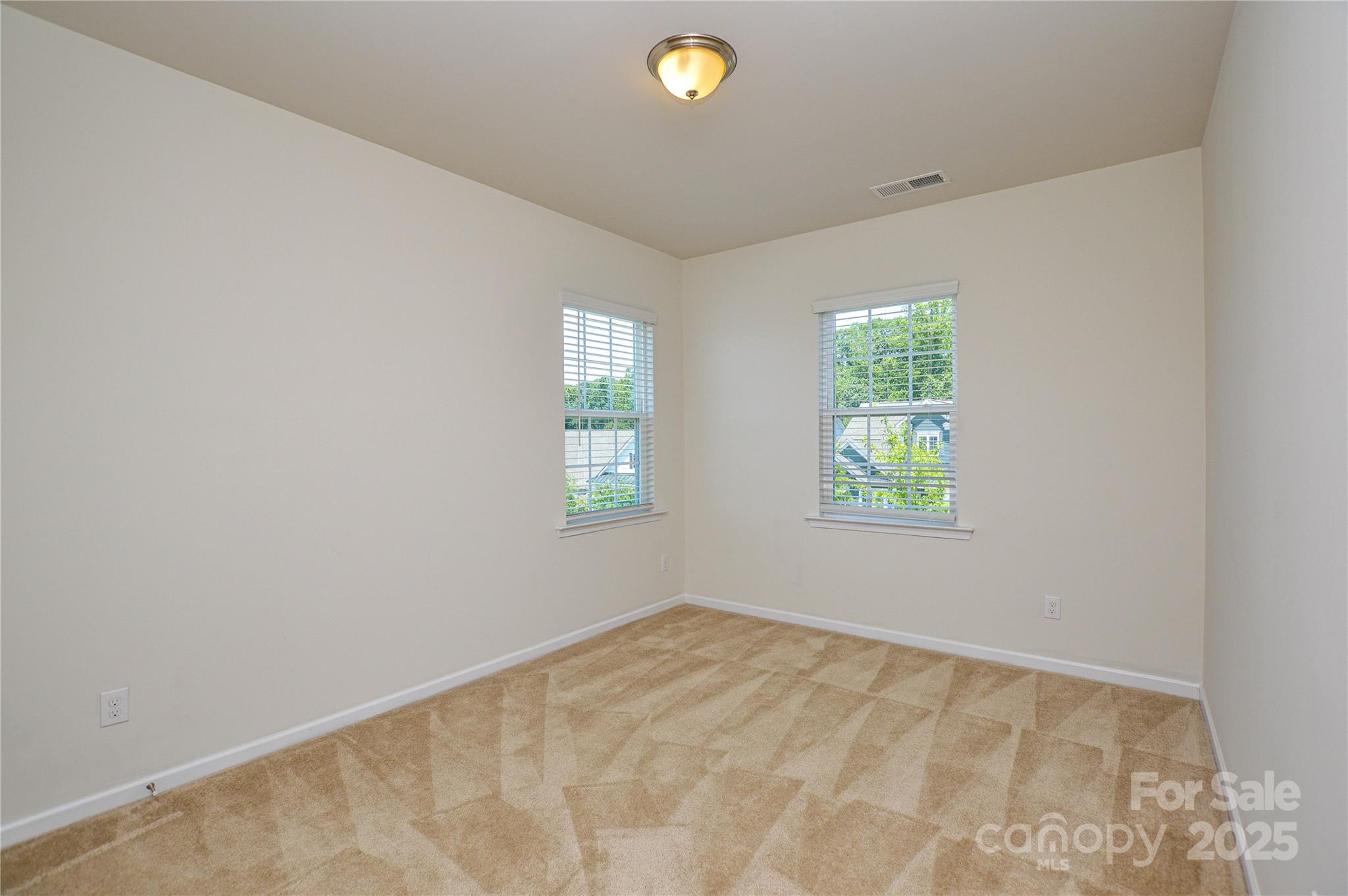 6096 Cloverdale Drive Fort Mill, SC 29708 - Photo 30 of 48 an empty room with a window