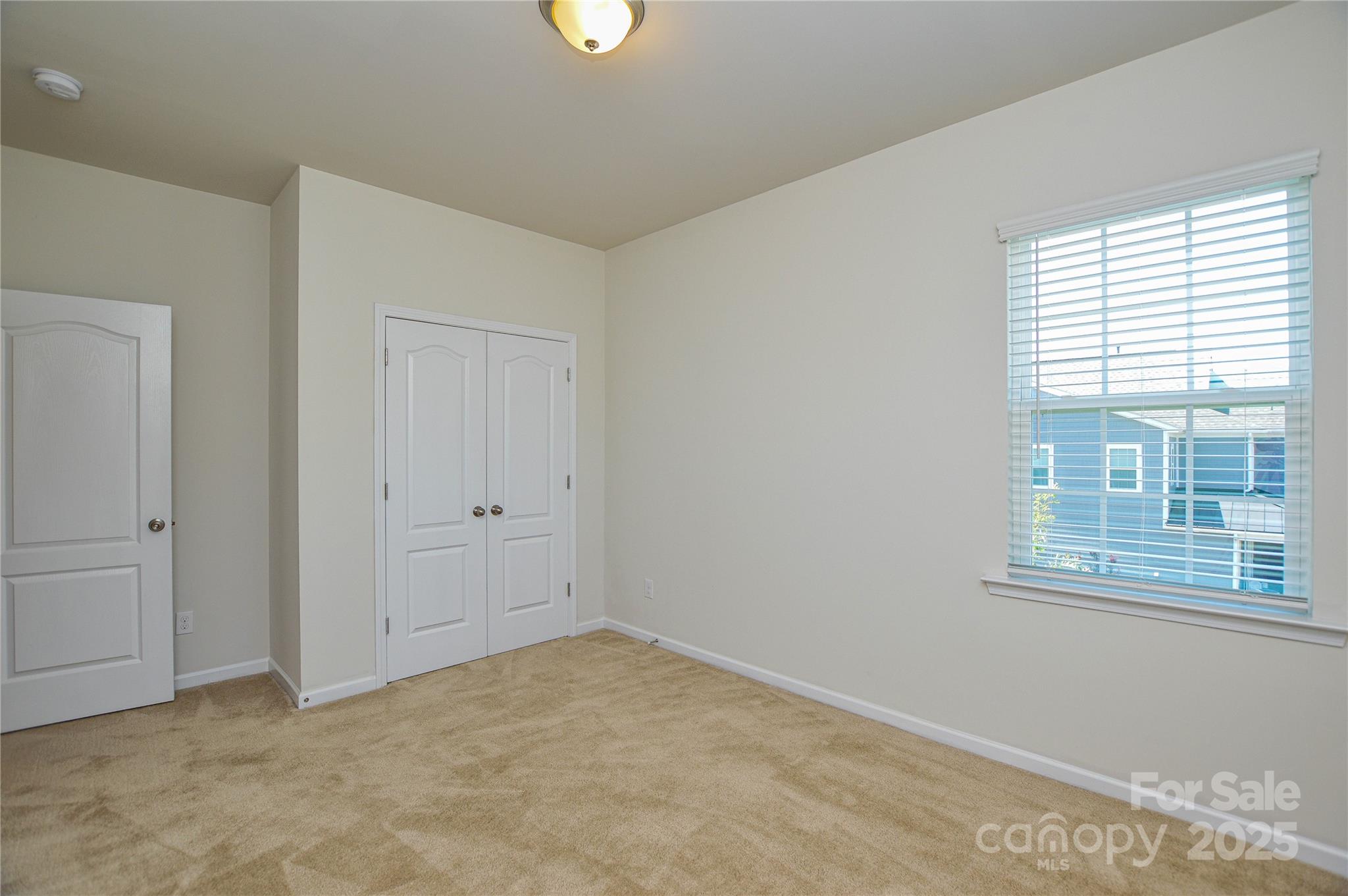 6096 Cloverdale Drive Fort Mill, SC 29708 - Photo 31 of 48 a view of an empty room with a window