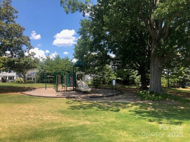6096 Cloverdale Drive Fort Mill, SC 29708 - Photo 47 of 48 a view of a playground with lots of trees and plants