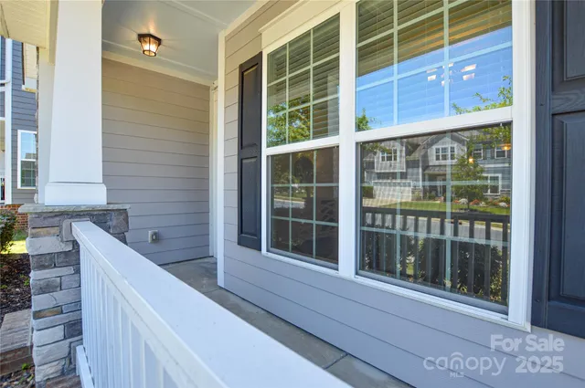 a view of a balcony and a window
