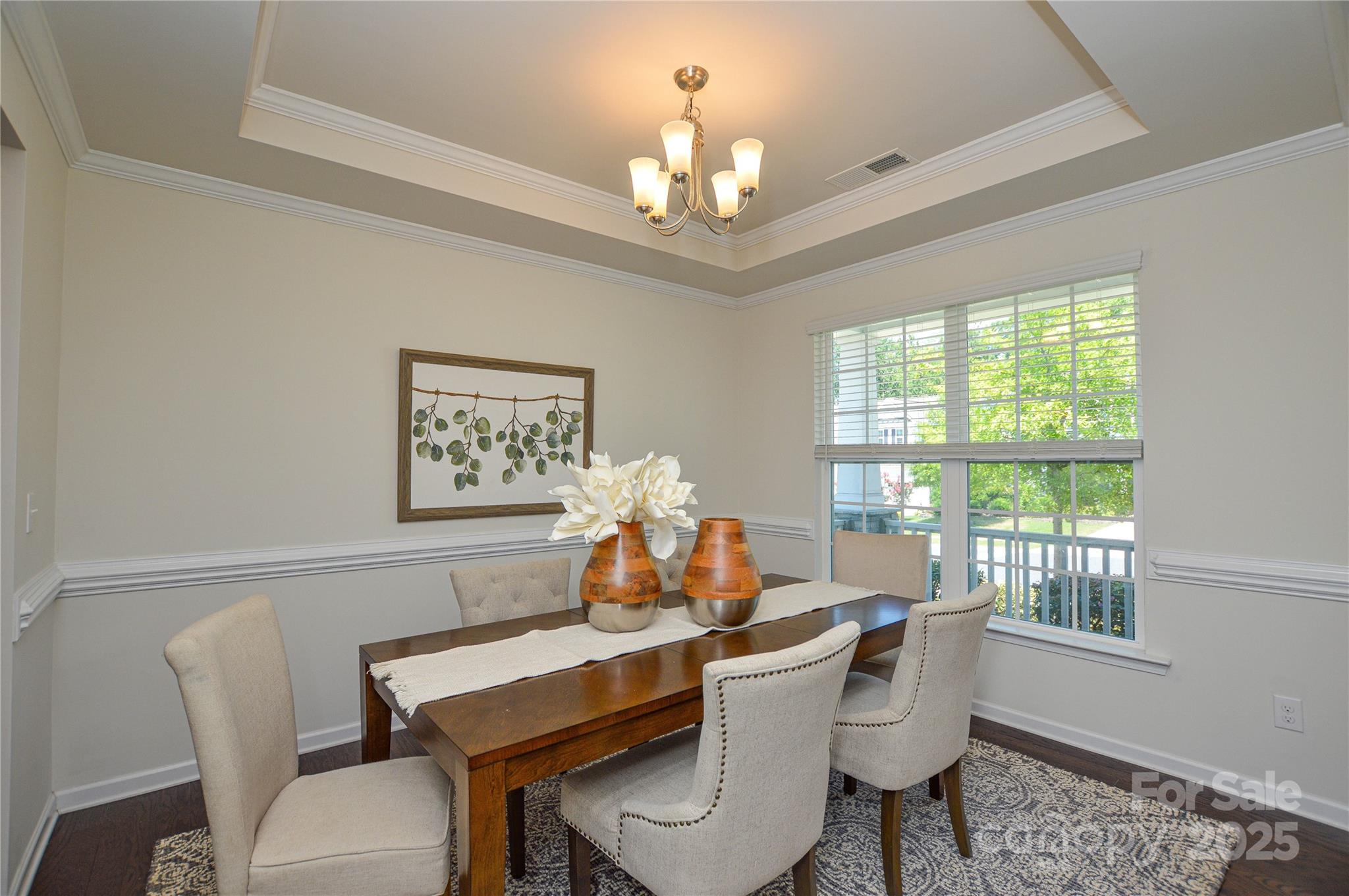6096 Cloverdale Drive Fort Mill, SC 29708 - Photo 8 of 48 a dining room with furniture a chandelier and window