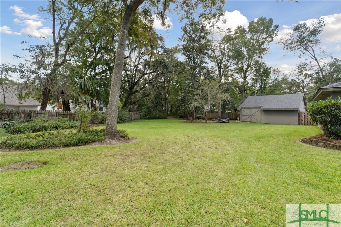 9 Levee Road Savannah, GA 31419 - Photo 31 of 37 Side Yard with stunning, mature landscaping.