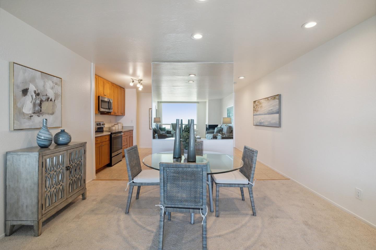360 Vallejo Drive, Unit 113 Millbrae, CA 94030 - Photo 16 of 34 a view of a dining room with furniture